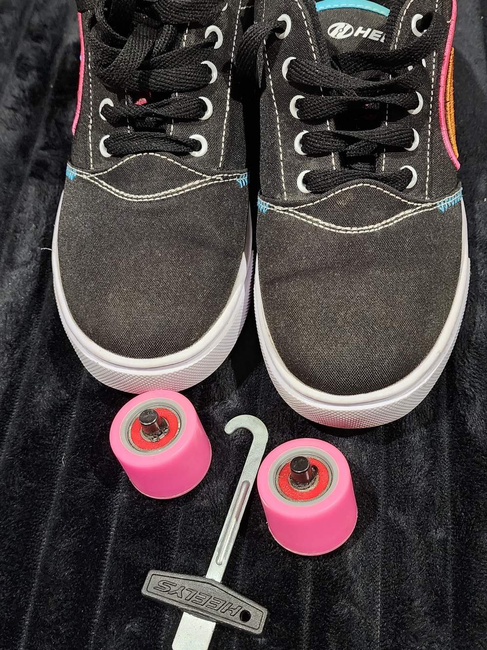Heelys Black Canvas Sneakers with Pink Wheels and Turquoise Accents